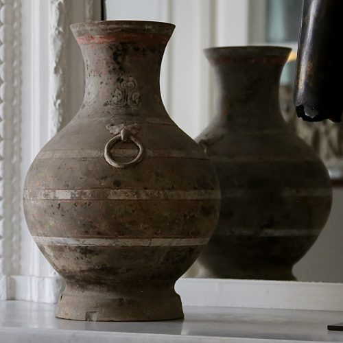 Hu painted vase with a taotie mask