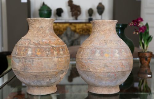 Pair of painted vases with duck patterns
